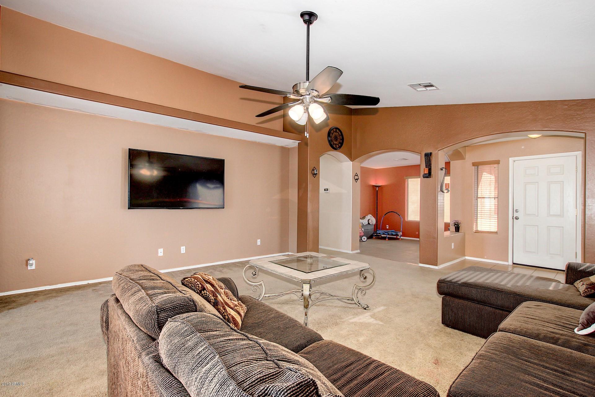 2512 West Darrel Road Phoenix, AZ 85041 - Photo 6 of 24 Living Room and View of Den