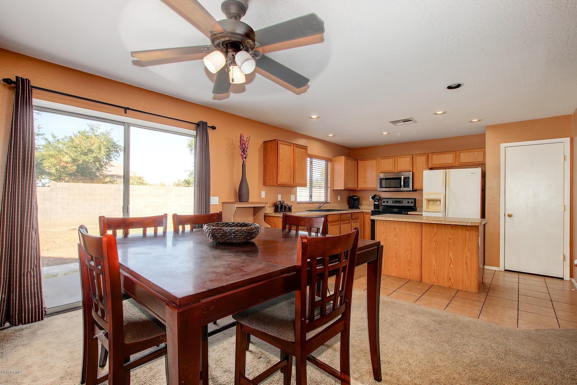 2512 West Darrel Road Phoenix, AZ 85041 - Photo 8 of 24 Dining Room and Kitchen