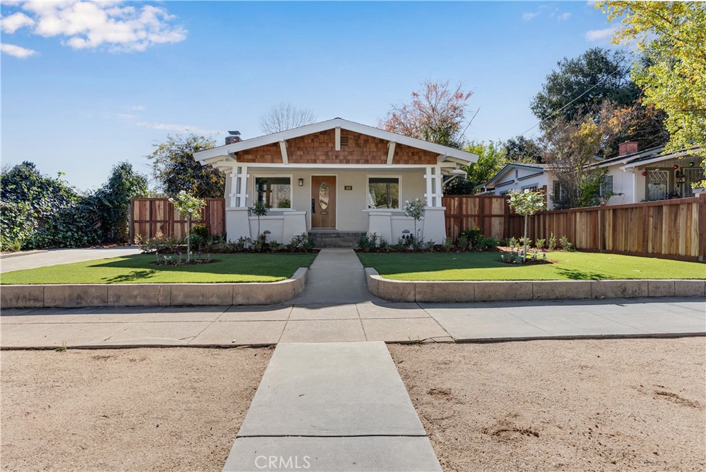 400 Flower Street Pasadena, CA 91104 - Photo 2 of 37 a view of a house with a big yard with potted plants