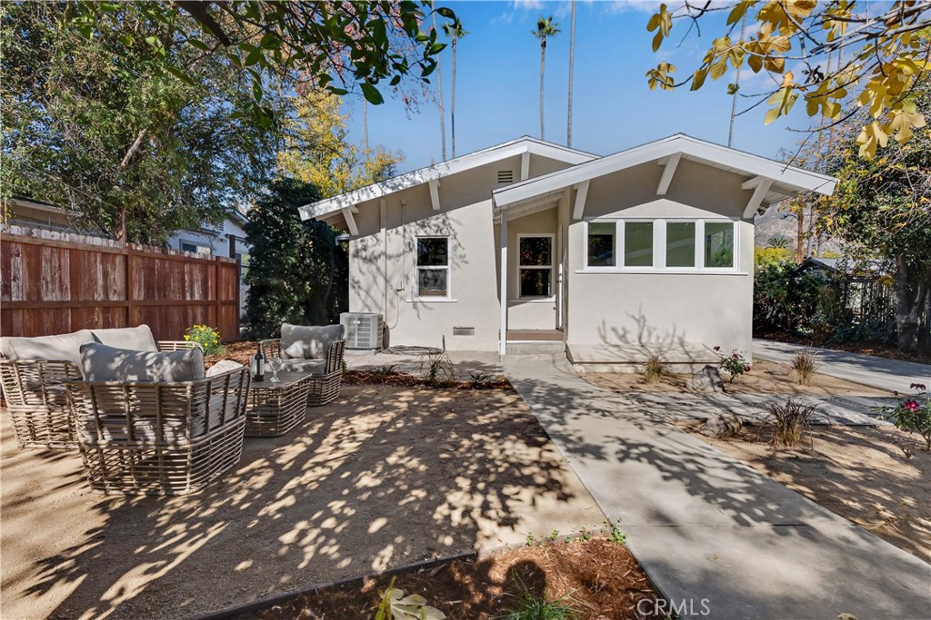 400 Flower Street Pasadena, CA 91104 - Photo 30 of 37 a view of a house with backyard and sitting area