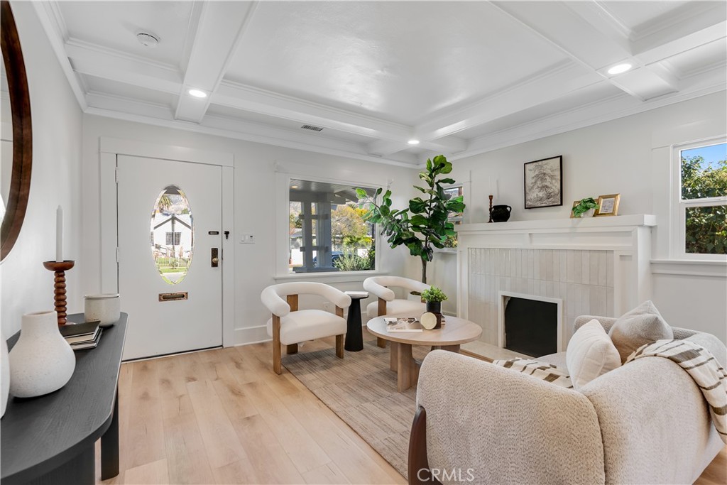 400 Flower Street Pasadena, CA 91104 - Photo 7 of 37 a living room with furniture and a fireplace