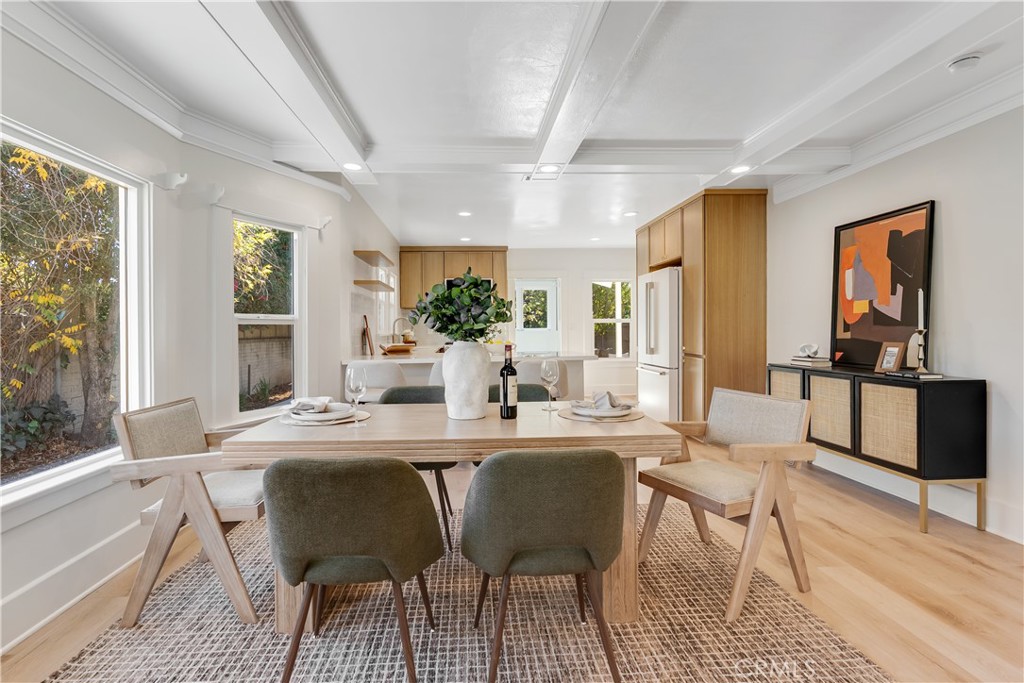 400 Flower Street Pasadena, CA 91104 - Photo 9 of 37 a view of a dining room with furniture window and wooden floor