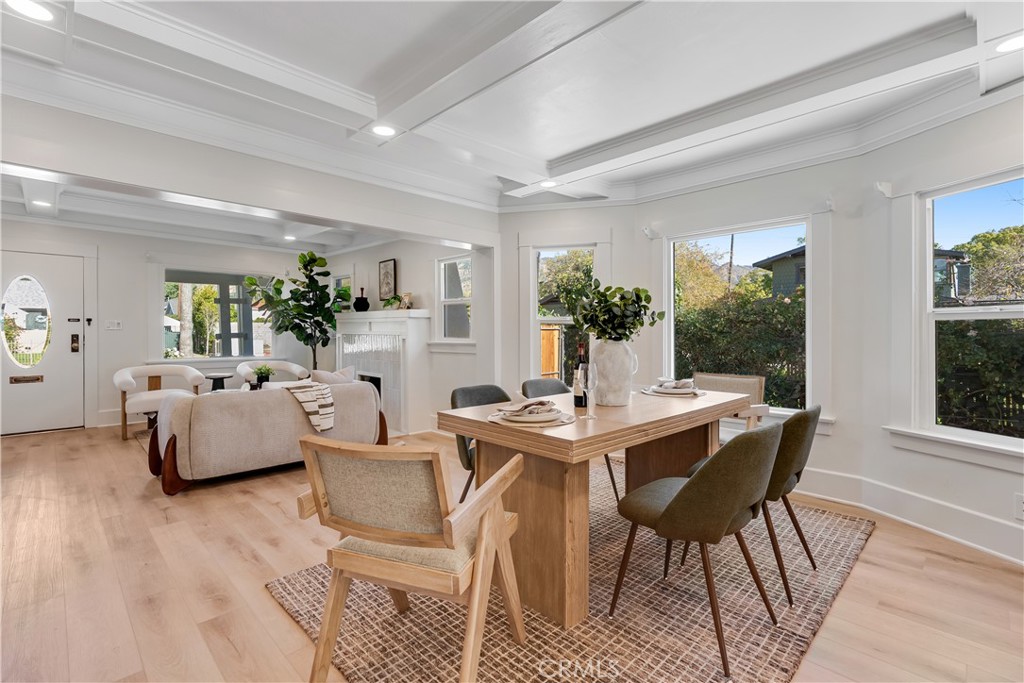 400 Flower Street Pasadena, CA 91104 - Photo 10 of 37 a view of a dining room with furniture window and wooden floor