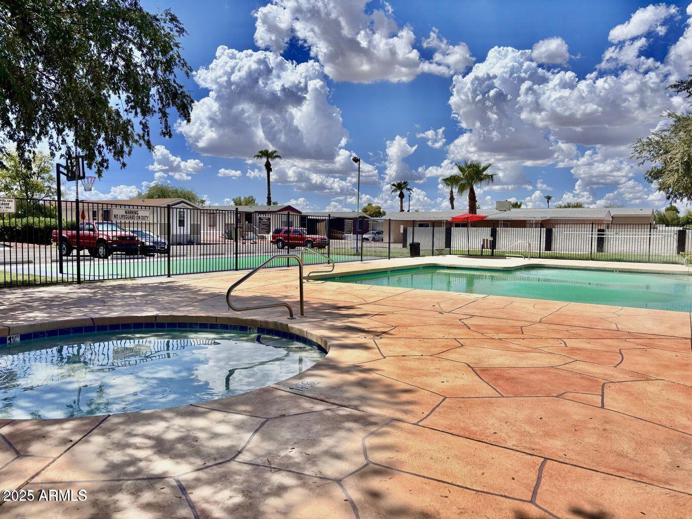 12721 West Greenway Road, Unit 114 El Mirage, AZ 85335 - Photo 8 of 10 a view of a playground