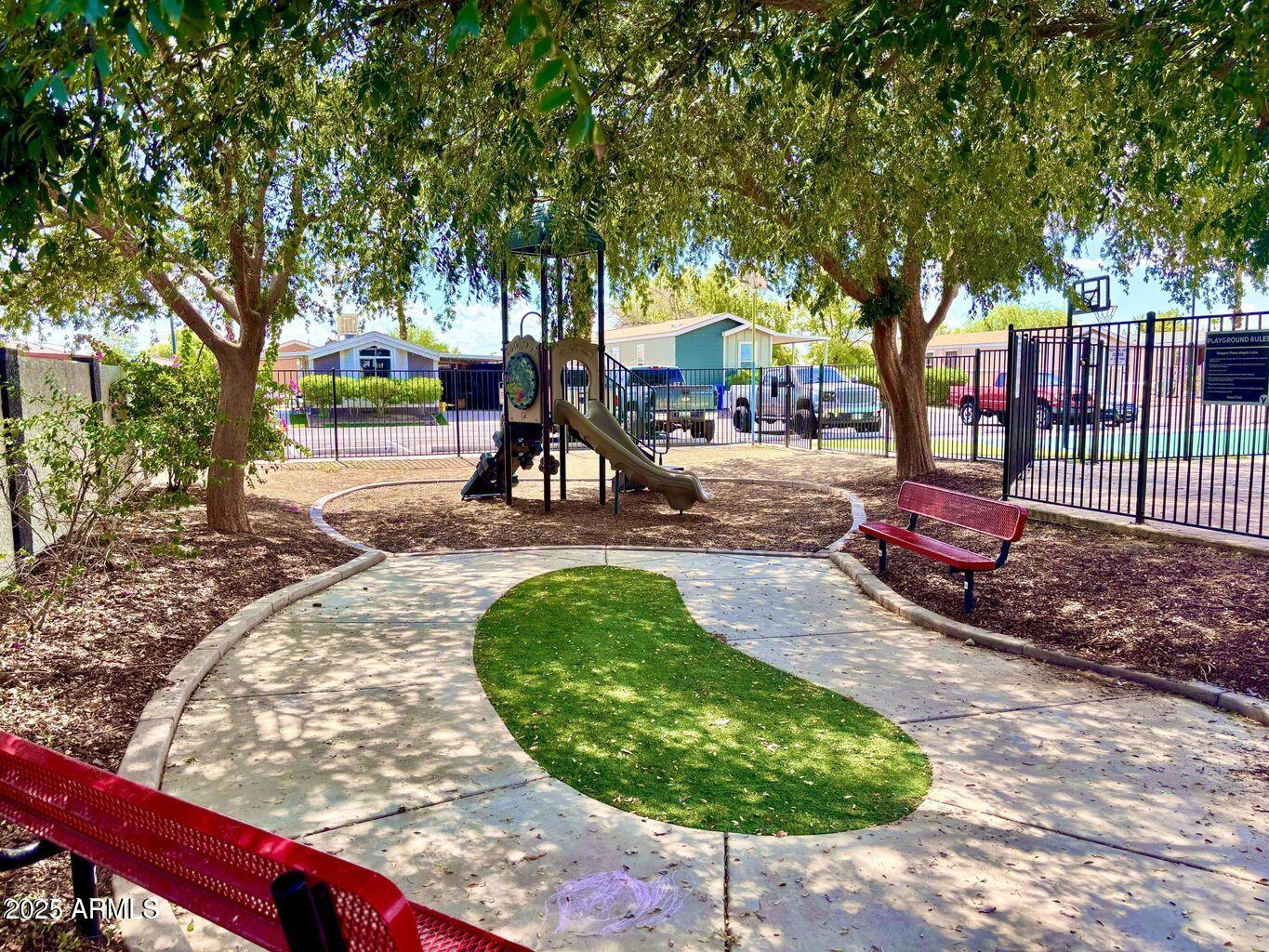 12721 West Greenway Road, Unit 114 El Mirage, AZ 85335 - Photo 9 of 10 a view of a park with slide
