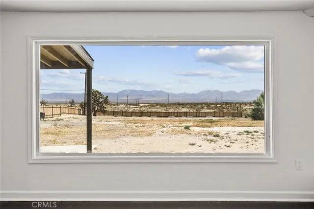 a view of a room and window