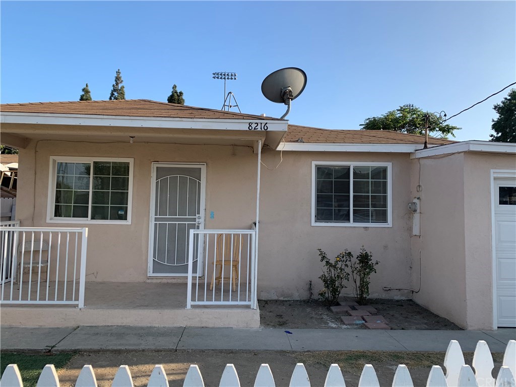 8216 Wilbarn Street Paramount, CA 90723 - Photo 2 of 27 a view of a house with a window