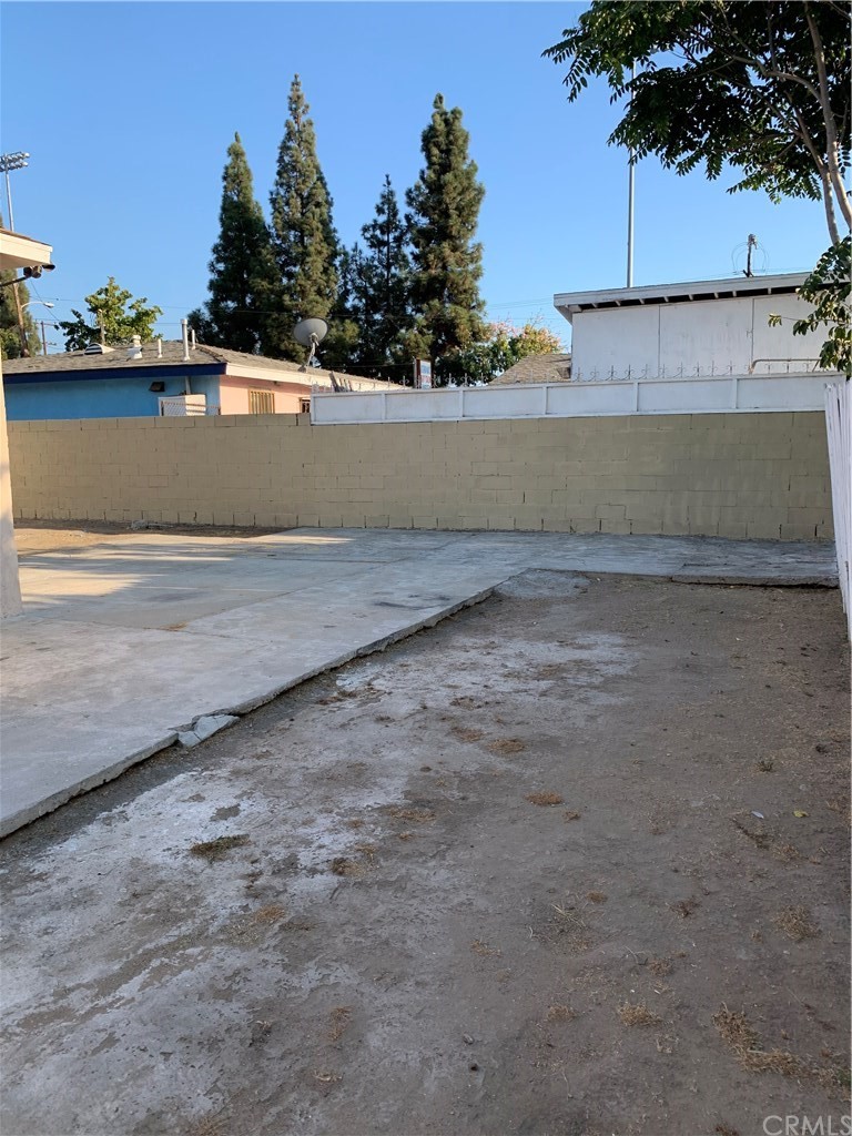 8216 Wilbarn Street Paramount, CA 90723 - Photo 23 of 27 a view of a backyard