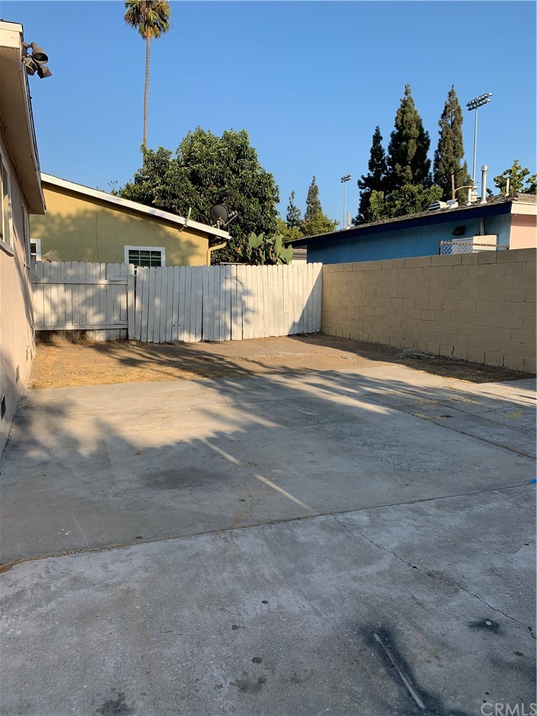 8216 Wilbarn Street Paramount, CA 90723 - Photo 24 of 27 a view of a backyard of a house