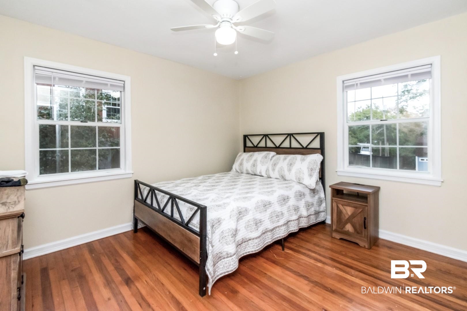 61 Nack Lane Mobile, AL 36608 - Photo 14 of 25 Bedroom with dark hardwood / wood-style floors and ceiling fan