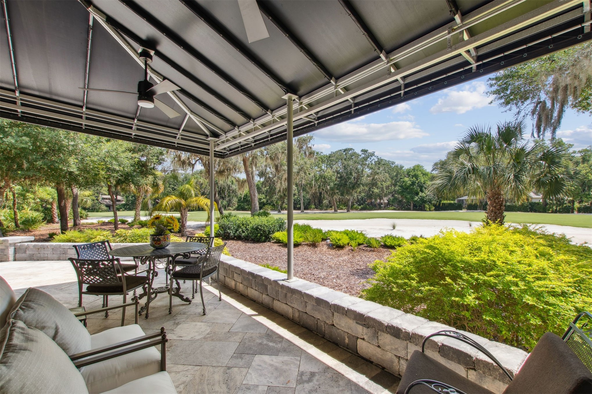 8 Marsh Hawk Road Amelia Island, FL 32034 - Photo 57 of 69 a view of a swimming pool with a patio