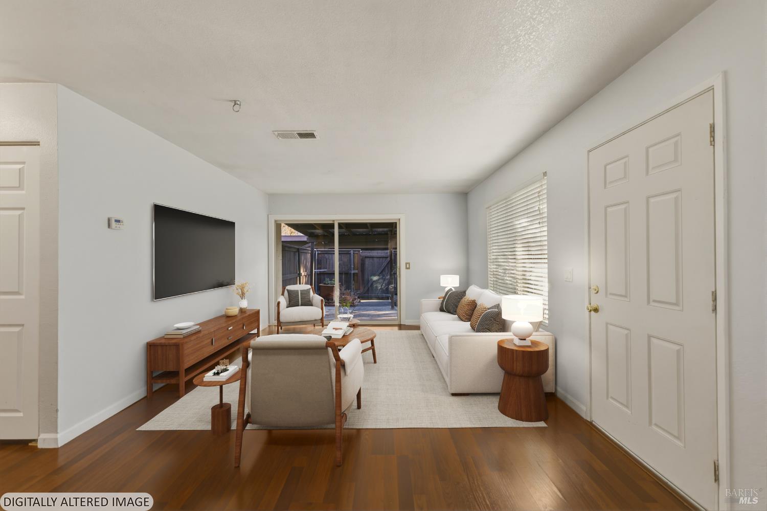 1741 Las Raposas Court Santa Rosa, CA 95409 - Photo 3 of 27 a living room with furniture and a flat screen tv