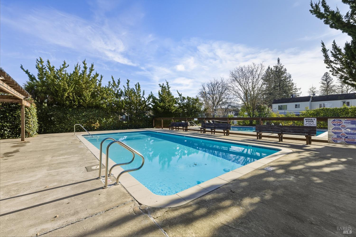 1741 Las Raposas Court Santa Rosa, CA 95409 - Photo 6 of 27 a view of swimming pool with a yard and sitting area