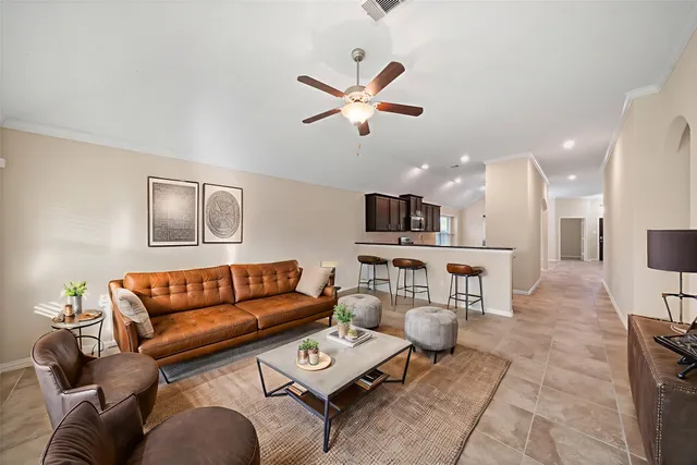 a view of a kitchen with a sink and a window