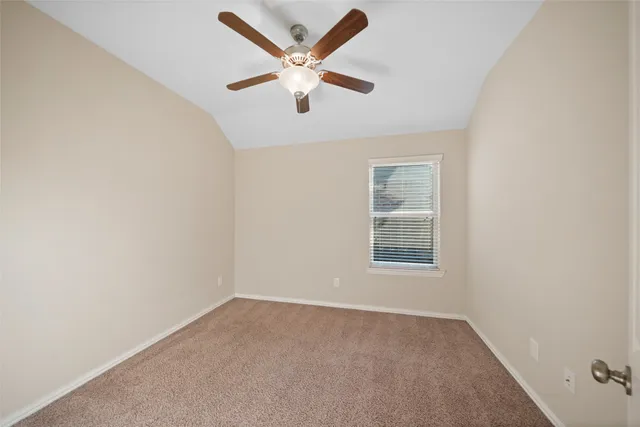 a view of a livingroom with a ceiling fan