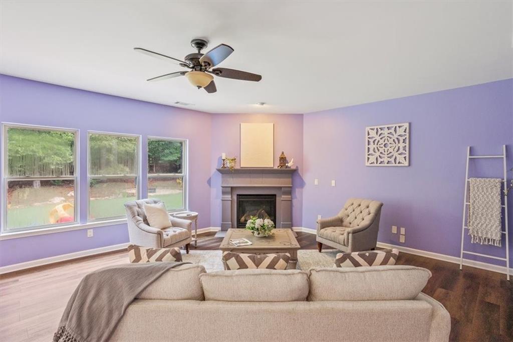 211 Parc Drive Canton, GA 30114 - Photo 12 of 62 a living room with furniture and a fireplace