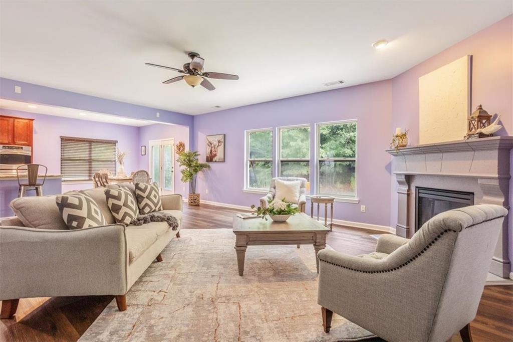 211 Parc Drive Canton, GA 30114 - Photo 13 of 62 a living room with furniture and a fireplace