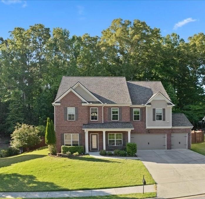 211 Parc Drive Canton, GA 30114 - Photo 2 of 62 front view of a house with a yard