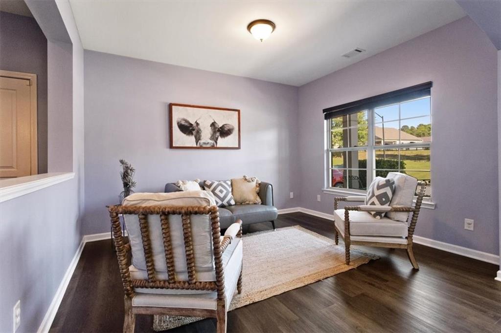 211 Parc Drive Canton, GA 30114 - Photo 23 of 62 a living room with furniture and a window