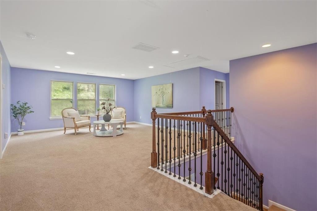 211 Parc Drive Canton, GA 30114 - Photo 25 of 62 a view of livingroom with furniture and floor to ceiling window