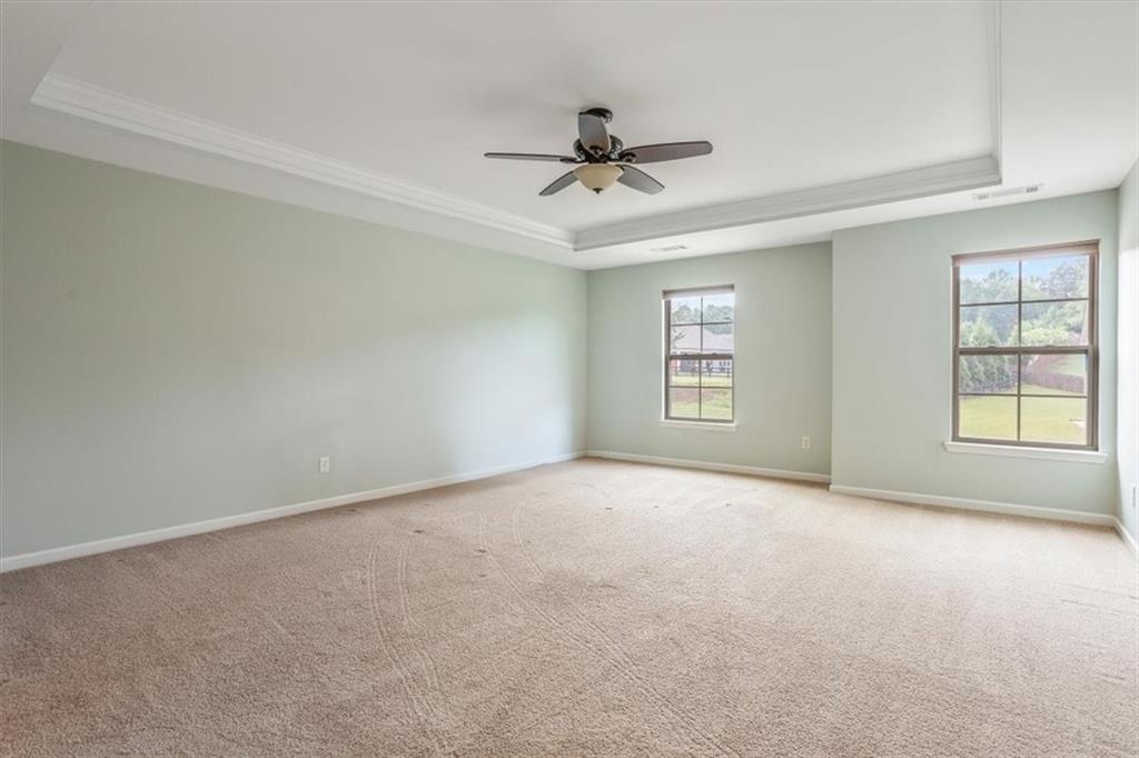 211 Parc Drive Canton, GA 30114 - Photo 27 of 62 a view of an empty room with windows