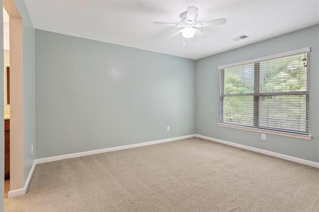 211 Parc Drive Canton, GA 30114 - Photo 34 of 62 wooden floor in an empty room with a window