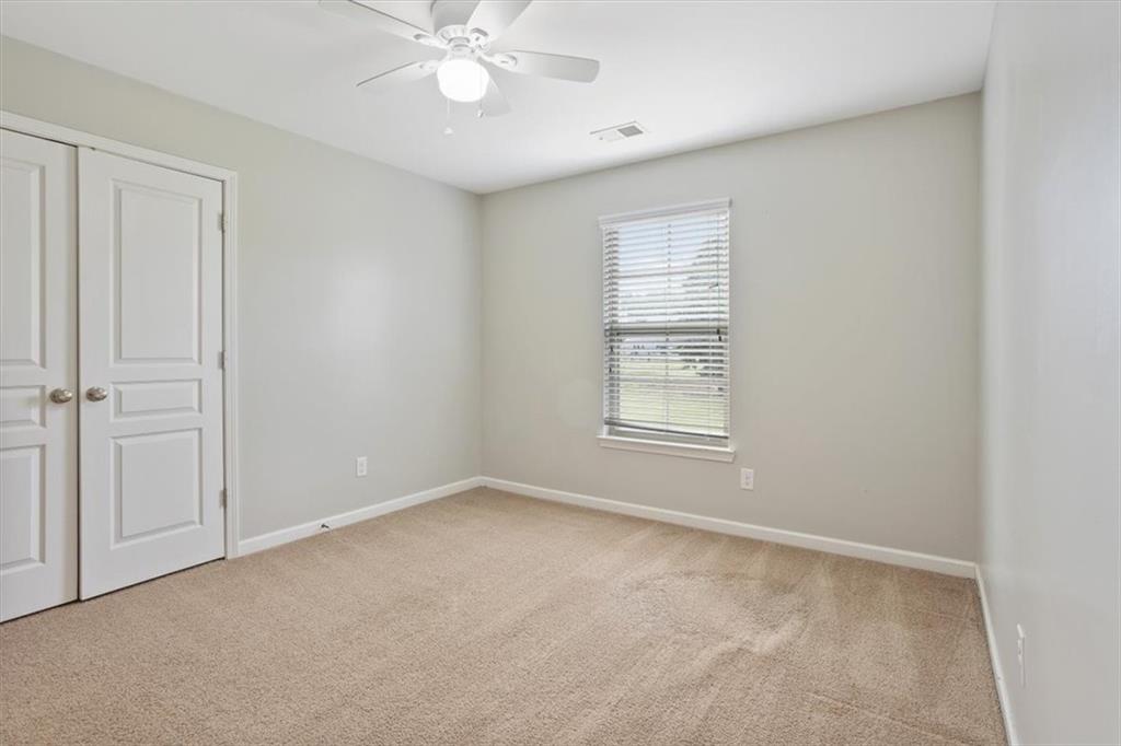 211 Parc Drive Canton, GA 30114 - Photo 40 of 62 a view of an empty room with a window