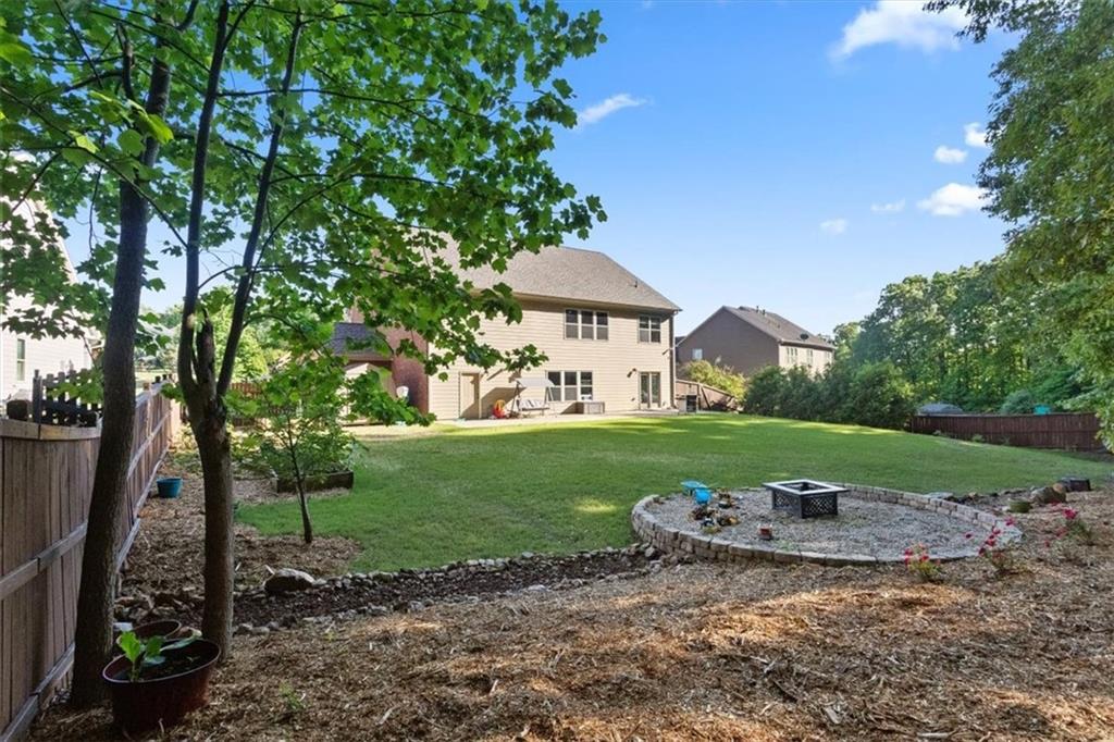 211 Parc Drive Canton, GA 30114 - Photo 43 of 62 a view of a house with a backyard