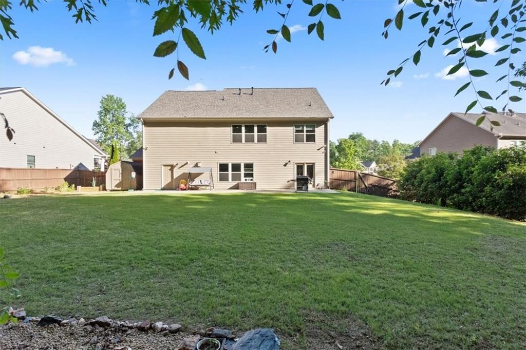 211 Parc Drive Canton, GA 30114 - Photo 45 of 62 a front view of house with yard