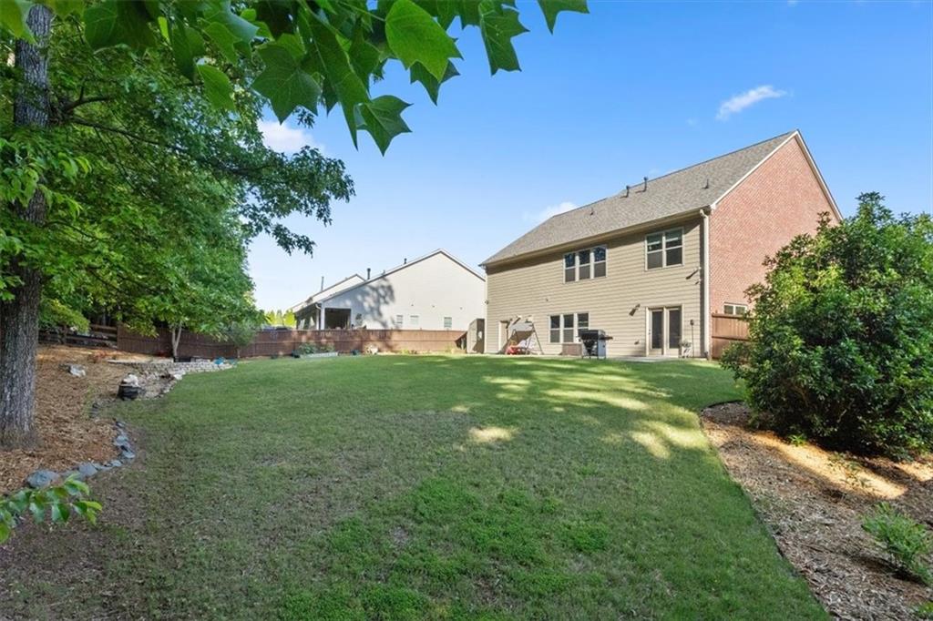 211 Parc Drive Canton, GA 30114 - Photo 46 of 62 a view of a house with backyard
