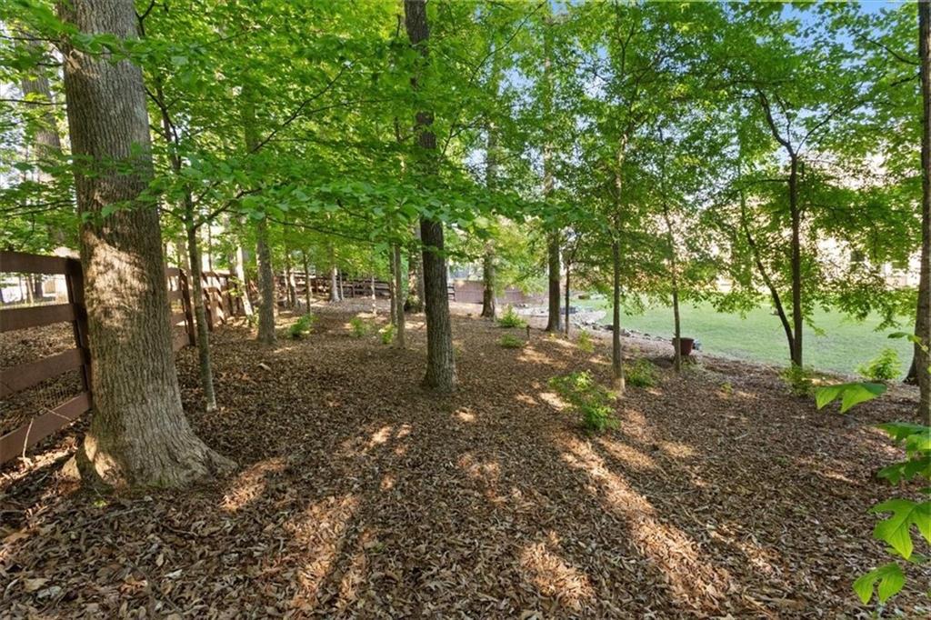 211 Parc Drive Canton, GA 30114 - Photo 48 of 62 a view of outdoor space with trees