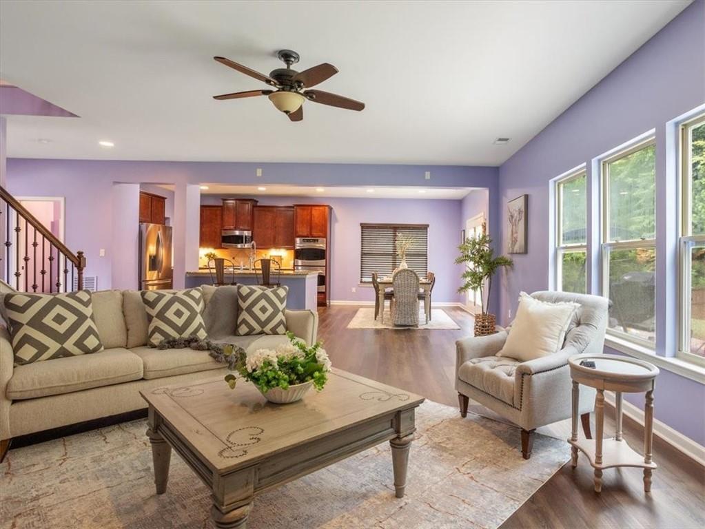 211 Parc Drive Canton, GA 30114 - Photo 6 of 62 a living room with furniture ceiling fan and a window