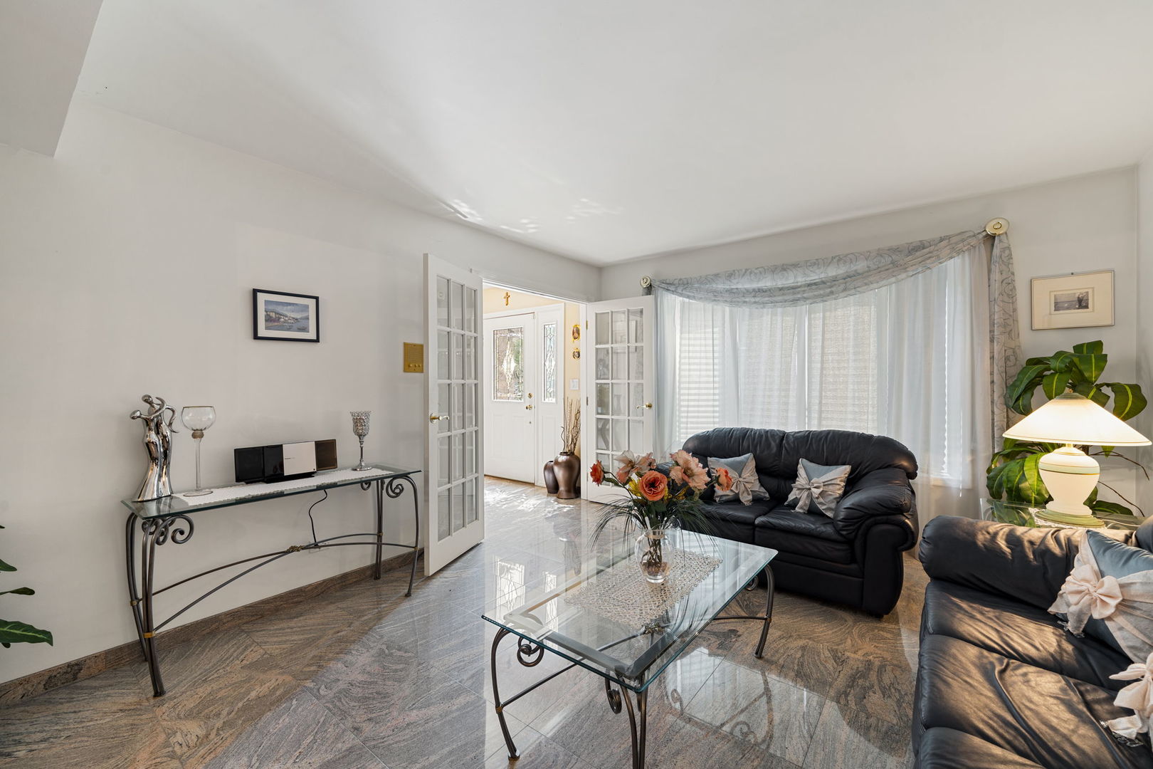 1520 Grove Drive Addison, IL 60101 - Photo 13 of 43 a living room with furniture and a window