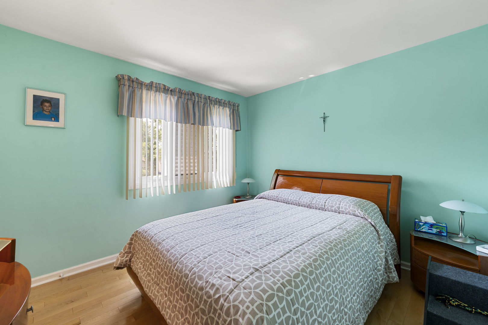 1520 Grove Drive Addison, IL 60101 - Photo 22 of 43 a bedroom with a bed and window