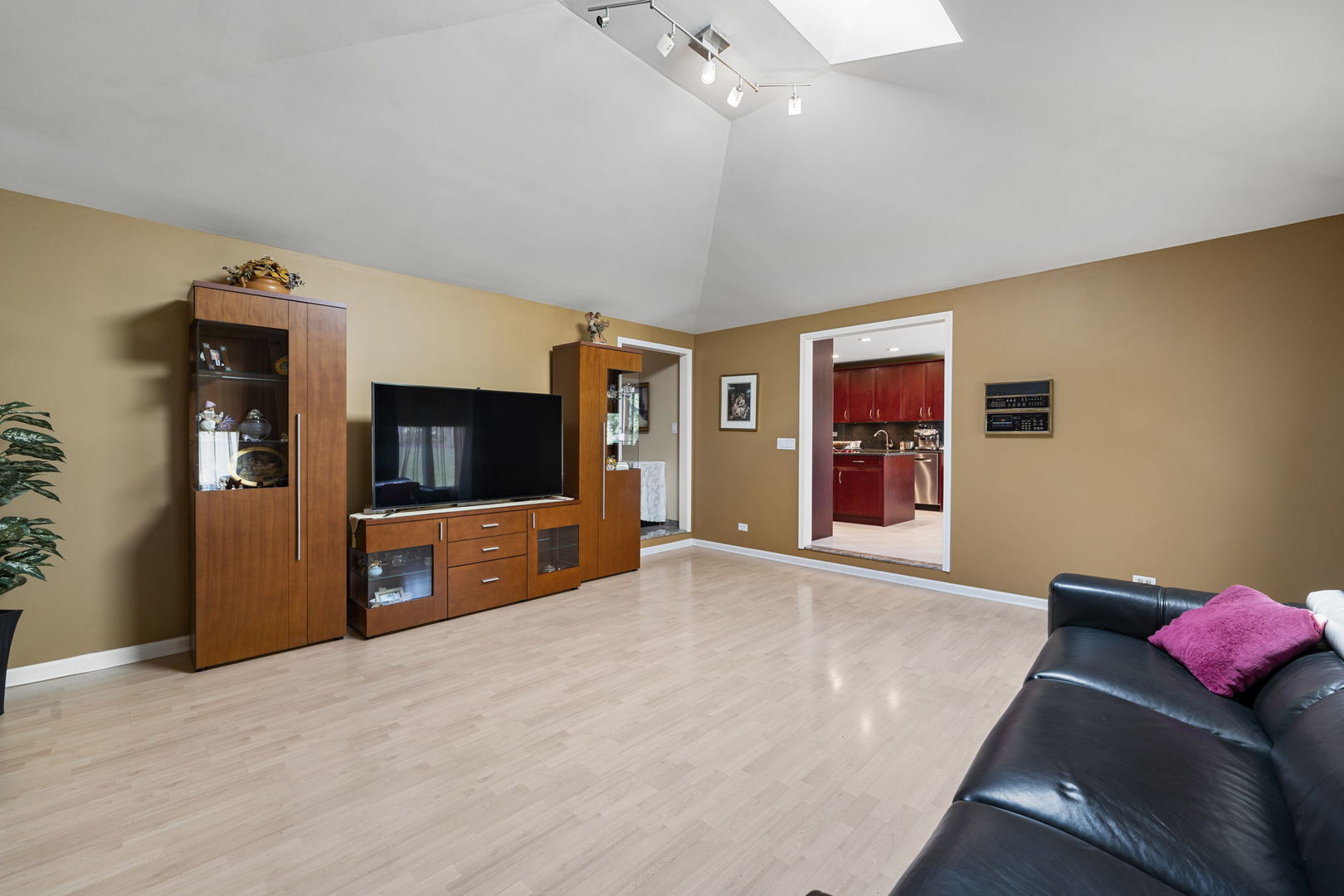 1520 Grove Drive Addison, IL 60101 - Photo 27 of 43 a living room with furniture and a flat screen tv