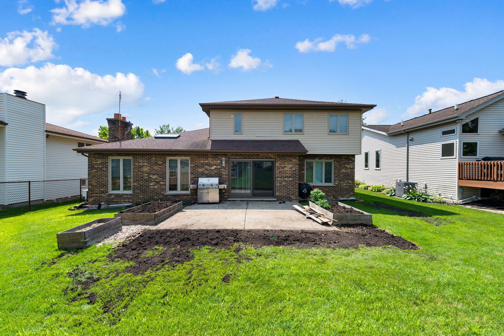 1520 Grove Drive Addison, IL 60101 - Photo 33 of 43 a view of a house with backyard and sitting area