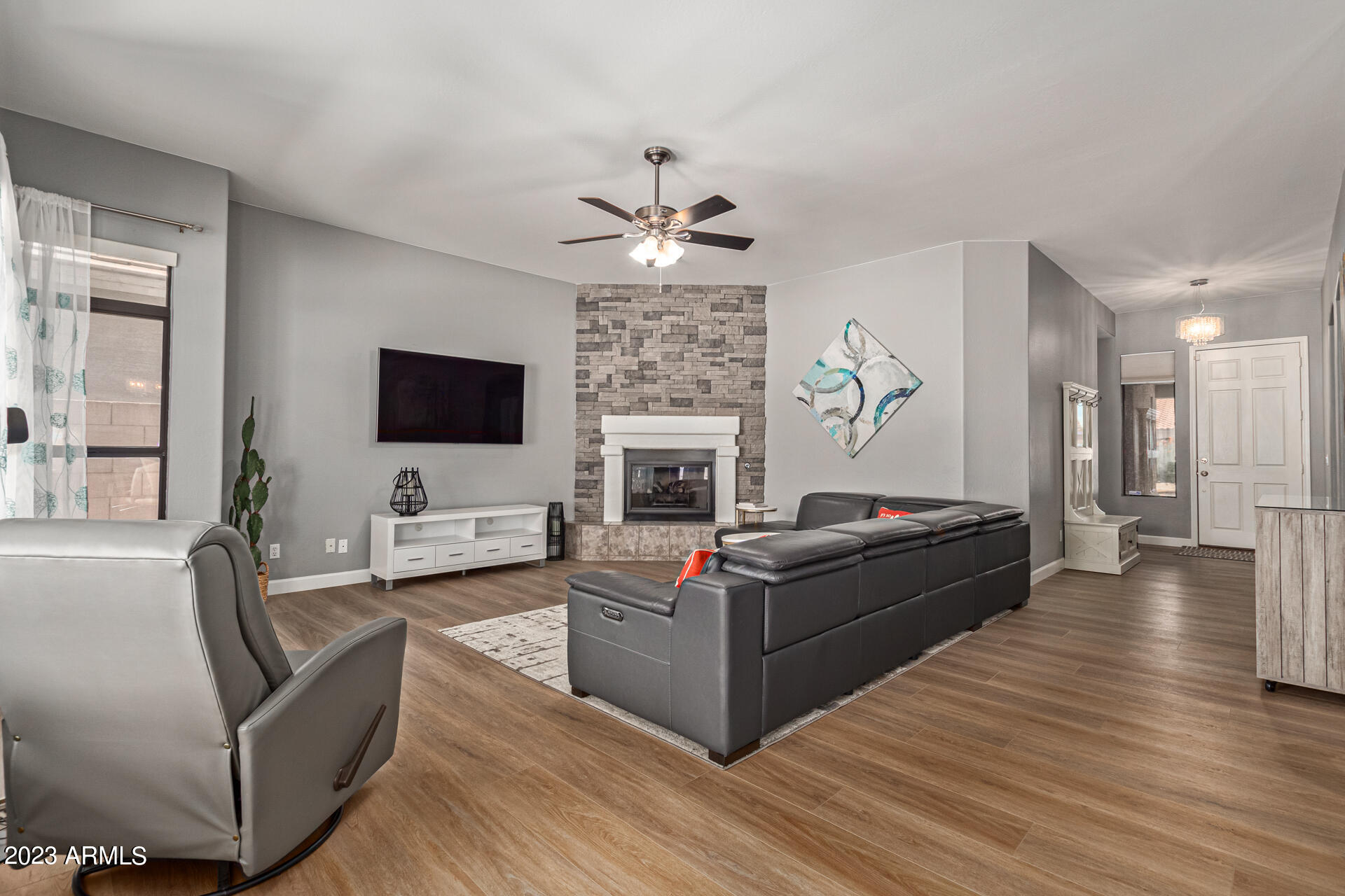 4506 East Jaeger Road Phoenix, AZ 85050 - Photo 8 of 47 Stacked stone fireplace in great room