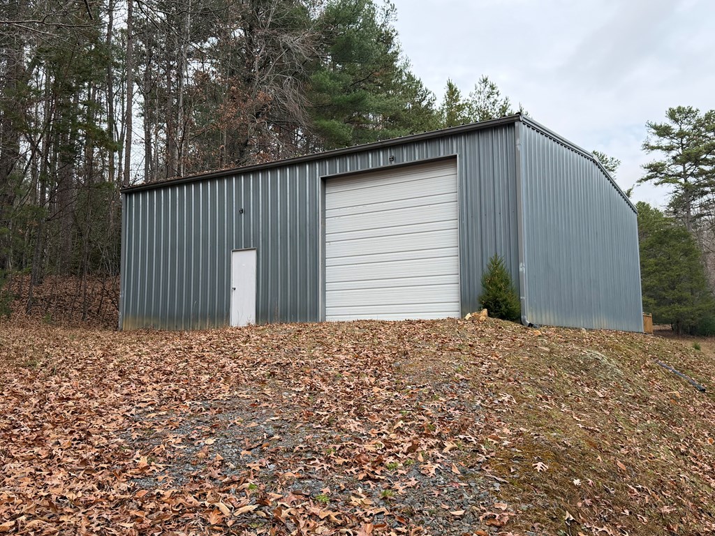 691 Mitchell Branch Road Morganton, GA 30560 - Photo 4 of 7 a house with a outdoor space