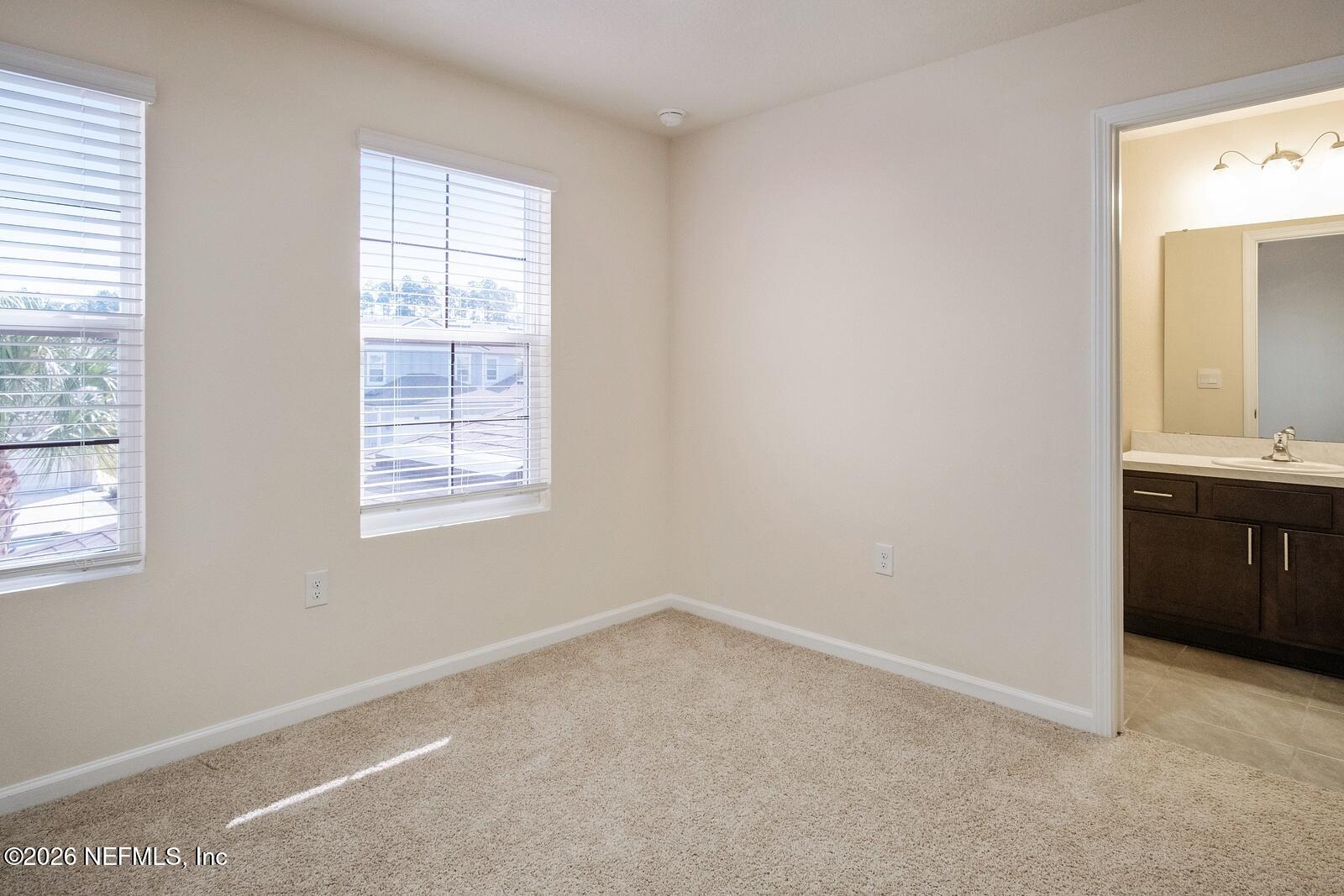 73 Java Lane St. Augustine, FL 32092 - Photo 14 of 18 an empty room with a window