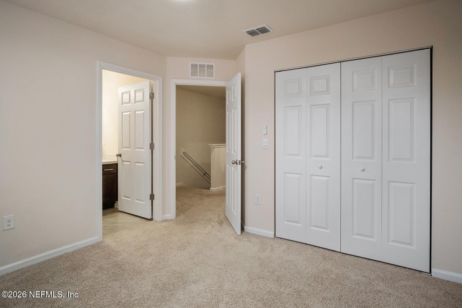 73 Java Lane St. Augustine, FL 32092 - Photo 15 of 18 a view of a room with an empty space and a hallway