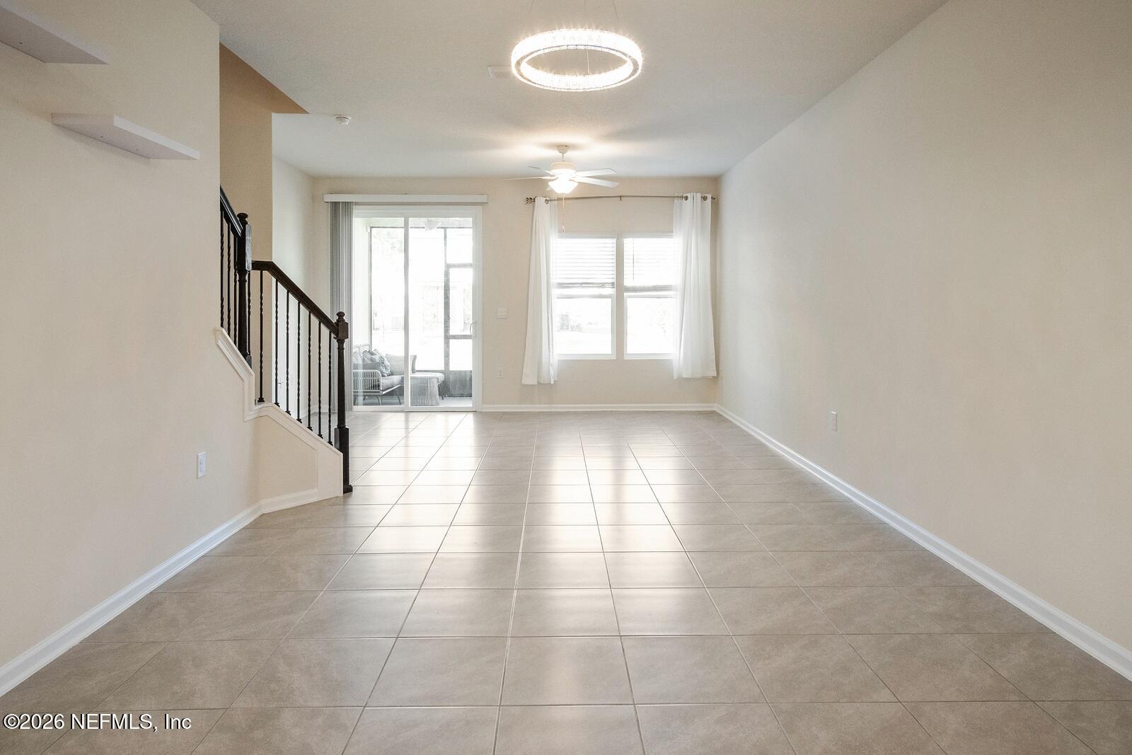 73 Java Lane St. Augustine, FL 32092 - Photo 4 of 18 a view of an empty room with a window