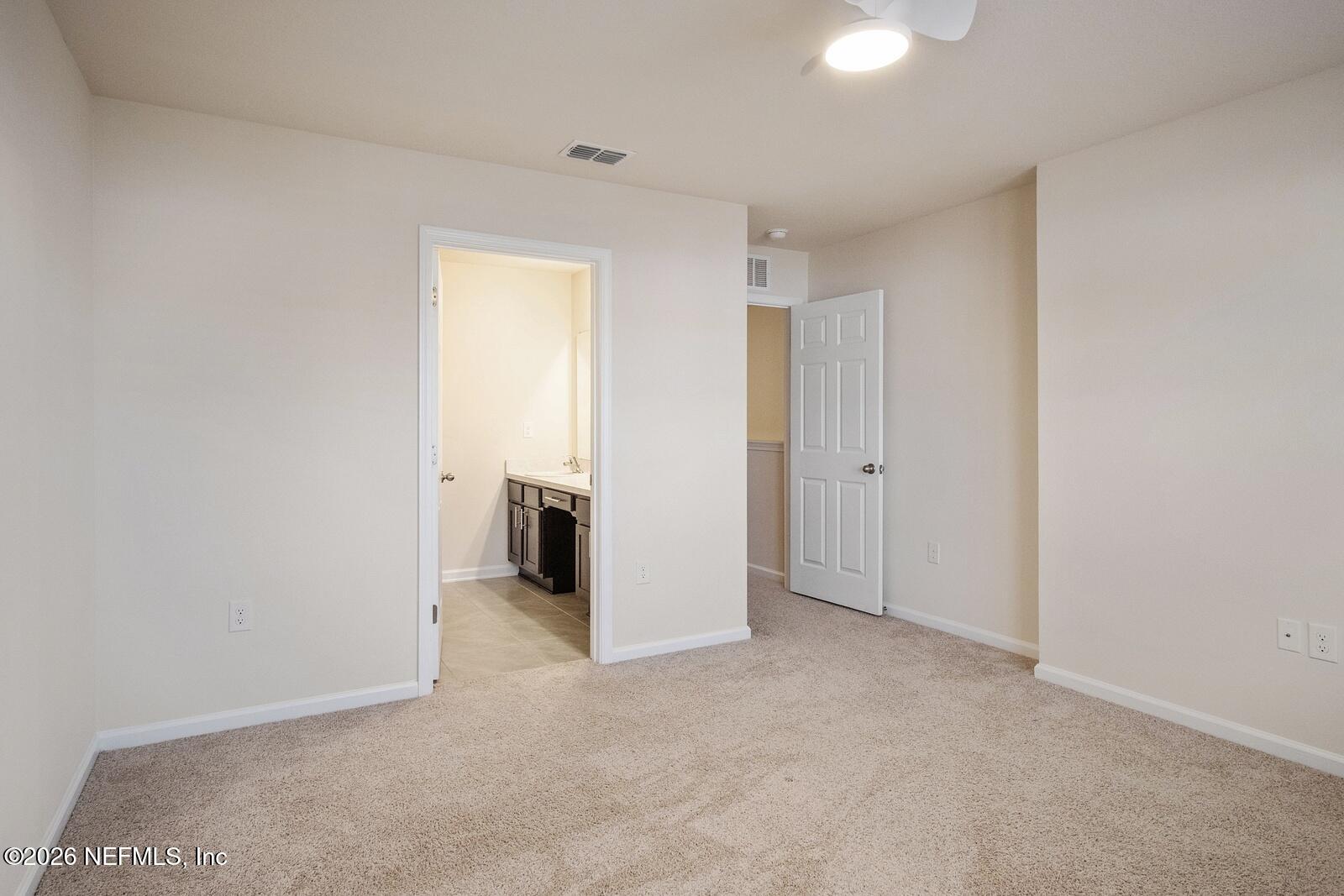 73 Java Lane St. Augustine, FL 32092 - Photo 7 of 18 an empty room with a bathroom