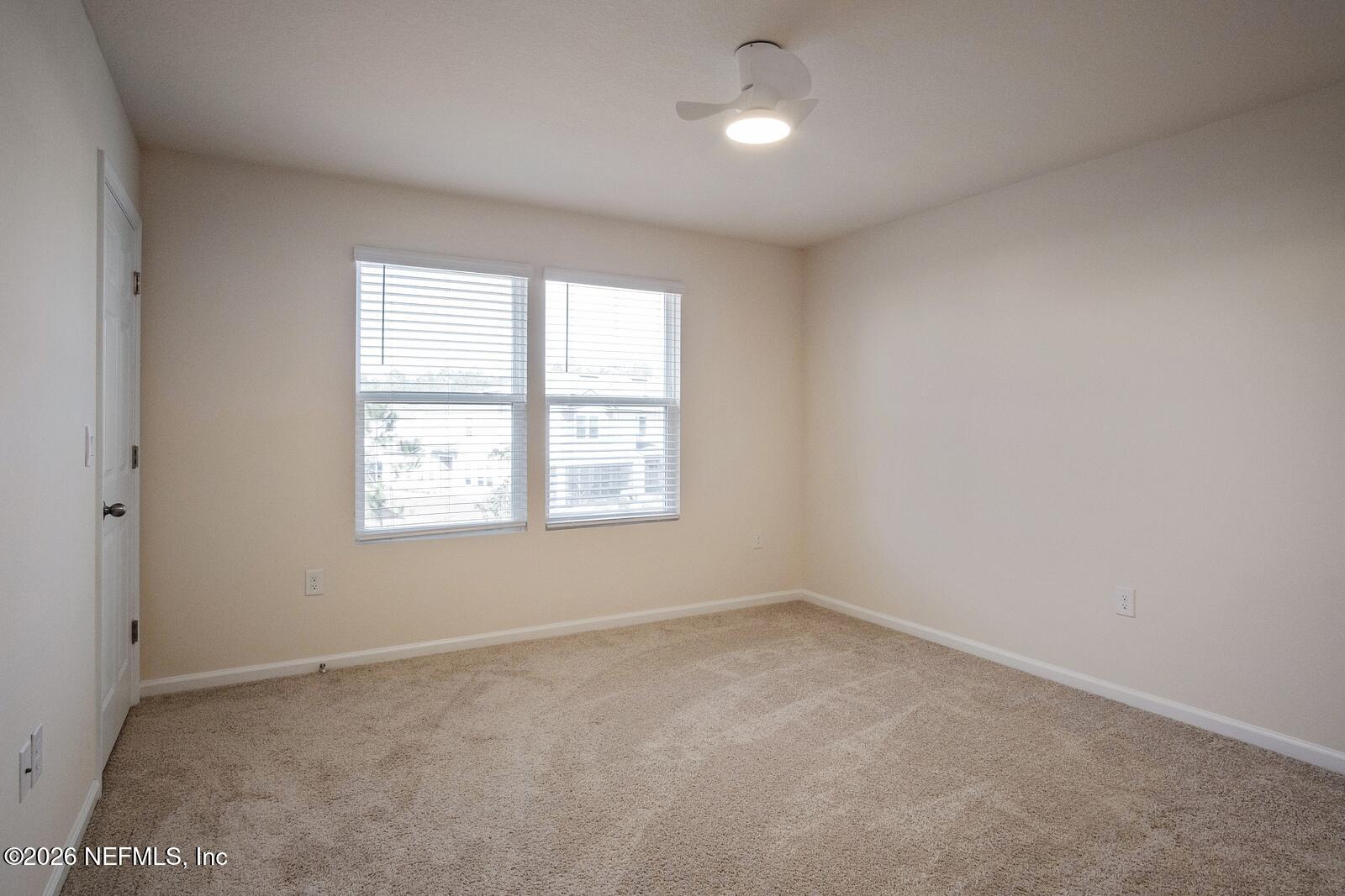 73 Java Lane St. Augustine, FL 32092 - Photo 10 of 18 an empty room with a window
