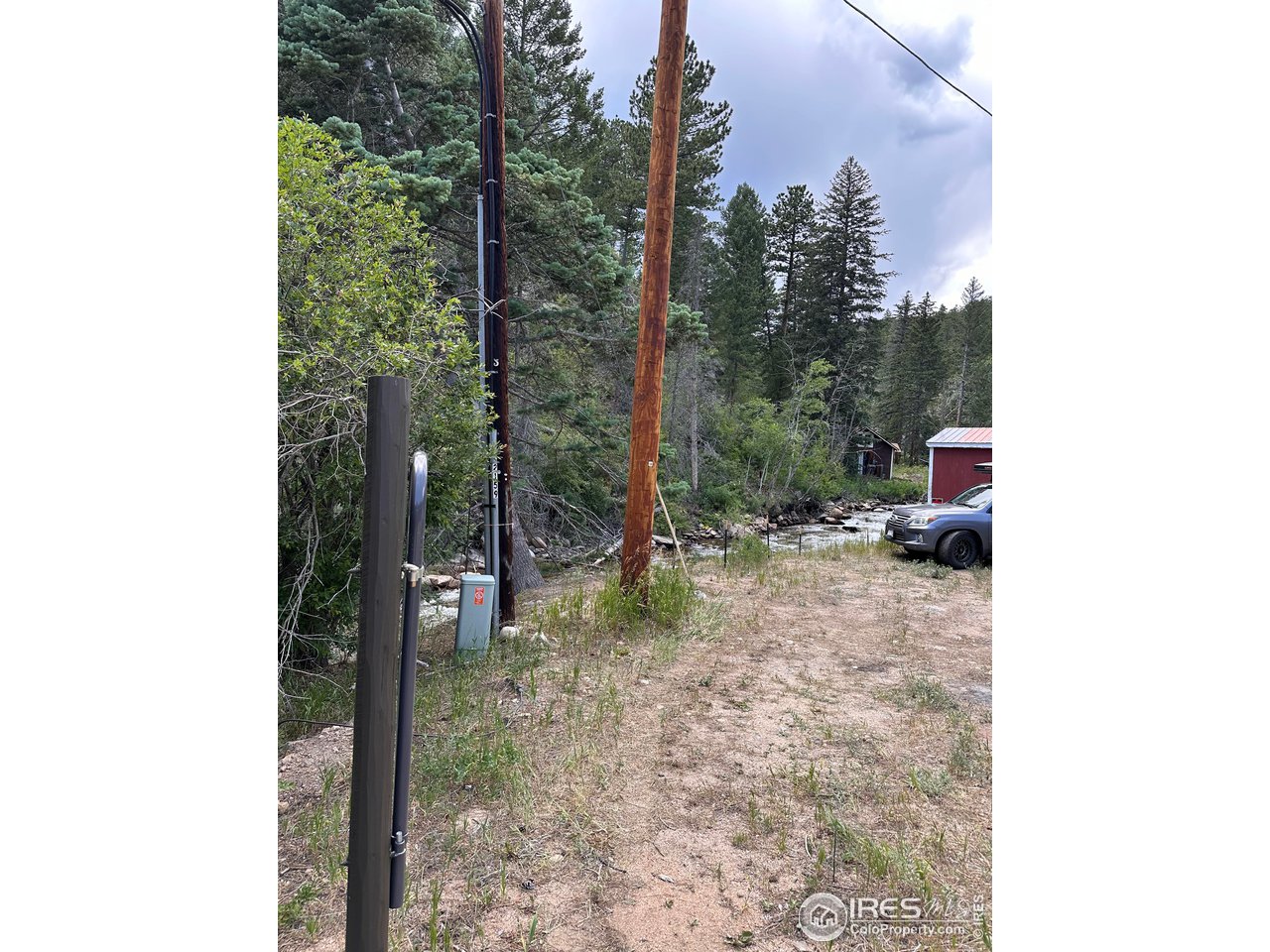 2159 Riverside Drive Lyons, CO 80540 - Photo 19 of 21 a backyard of a house with lots of green space