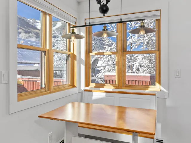 a kitchen with a sink appliances and cabinets