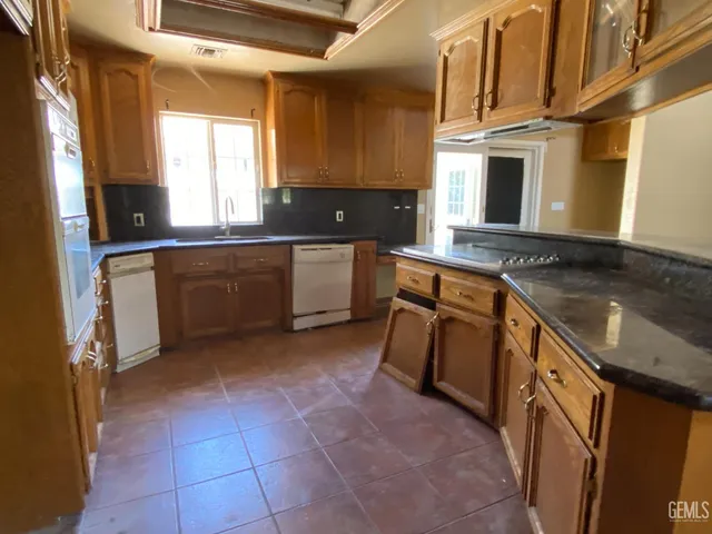 a view of empty room with windows