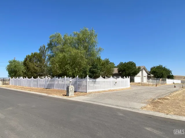 a front view of a house with a garage
