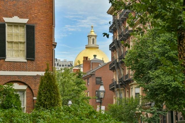 front view of a house with a small yard
