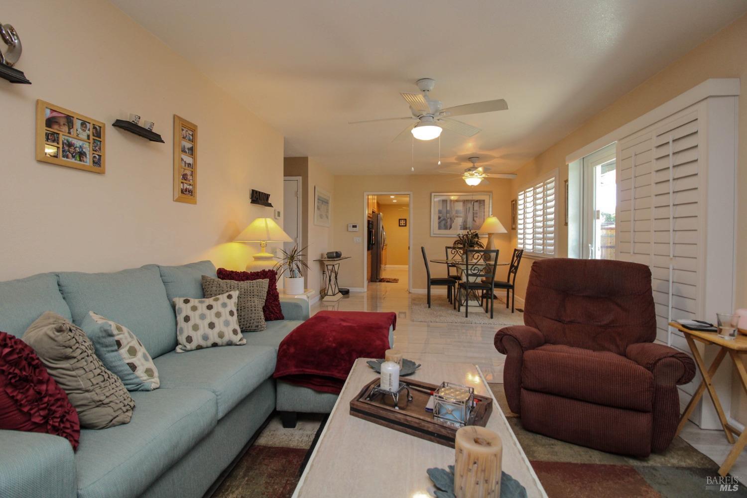 150 Lassen Circle Vacaville, CA 95687 - Photo 1 of 1 a living room with furniture and wooden floor