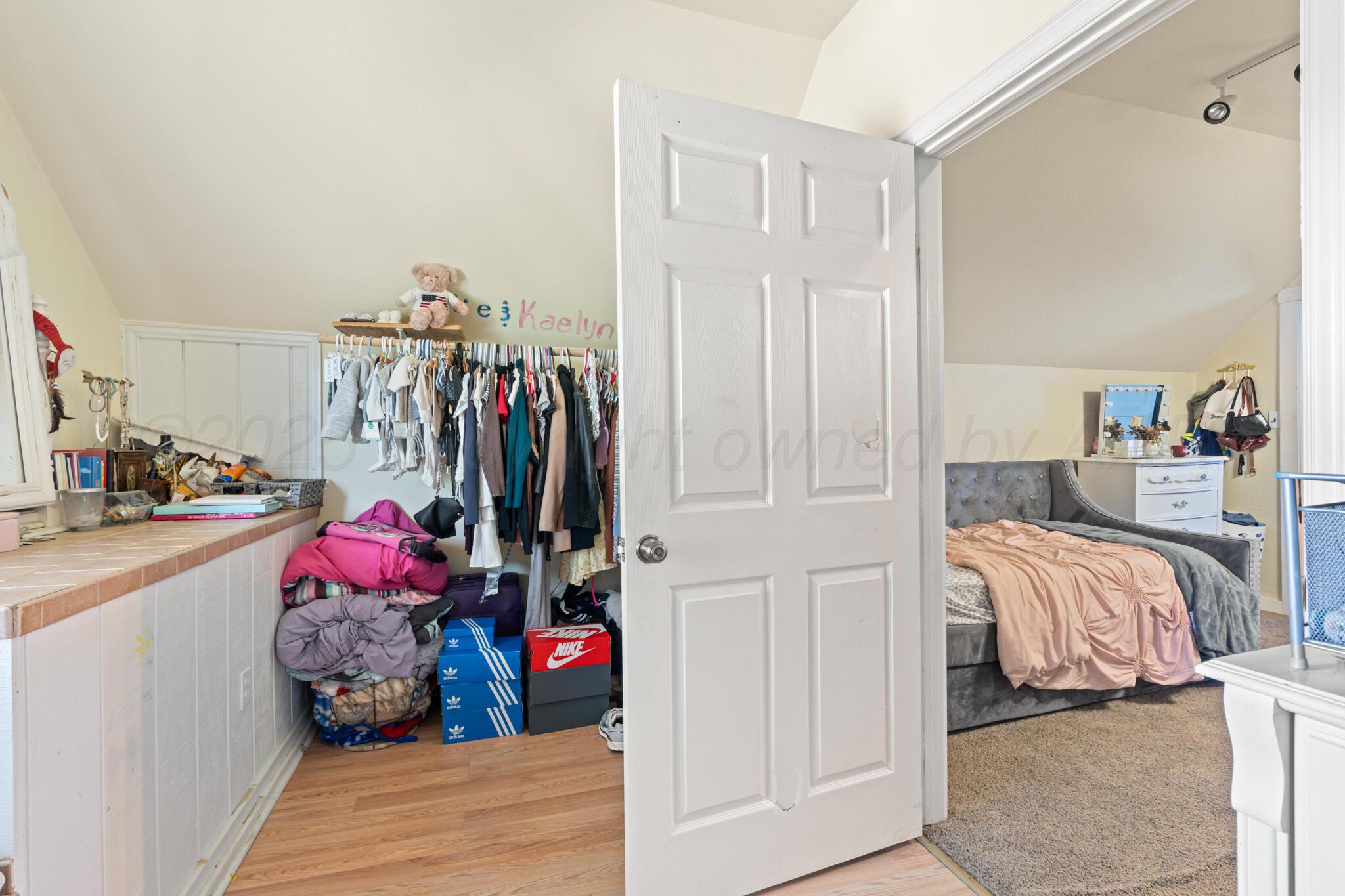 5211 River Road Amarillo, TX 79108 - Photo 28 of 39 a bed room with a bed and a closet